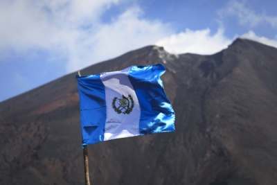 Flag against a volcano